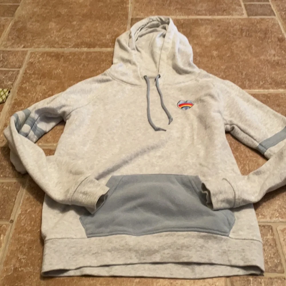 light gray hoodie with rainbow heart size small